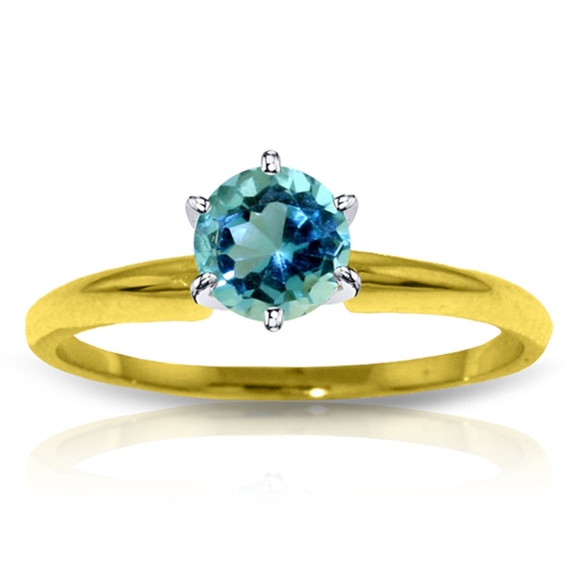 SOLID GOLD SOLITAIRE RING WITH NATURAL BLUE TOPAZ